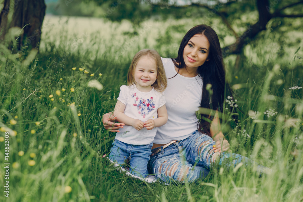 Fototapeta premium child near tree with mom