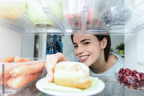 Photography Woman having an unhealthy snack