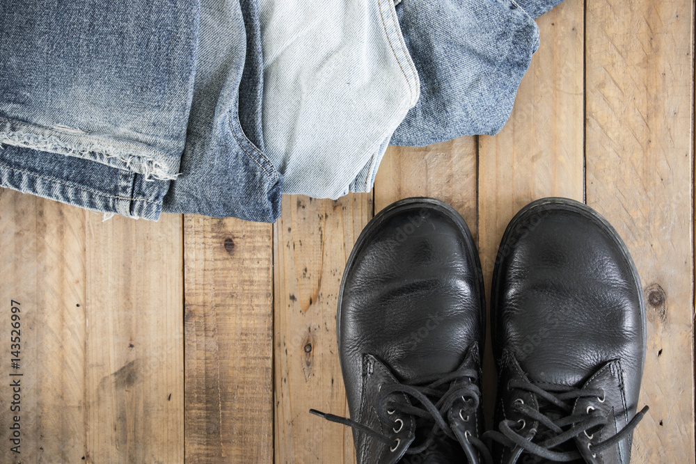 Jeans and shoes on wooden floor Jeans and shoes on wooden floor