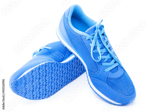 Pair of blue sport shoes on white background