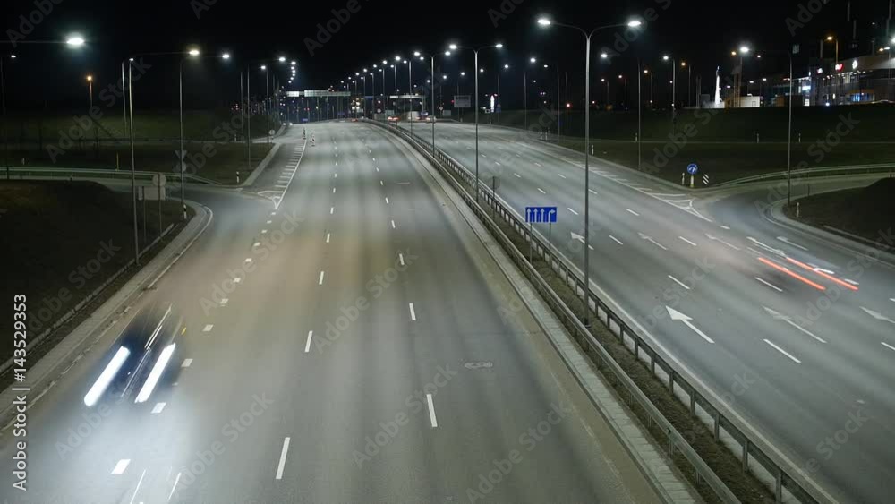 Long Exposure Time Lapse of Night Traffic in Vilnius, Lithuania. High-angle view from a bridge. Long Exposure Time Lapse of Night Traffic in Vilnius, Lithuania. High-angle view from a bridge.