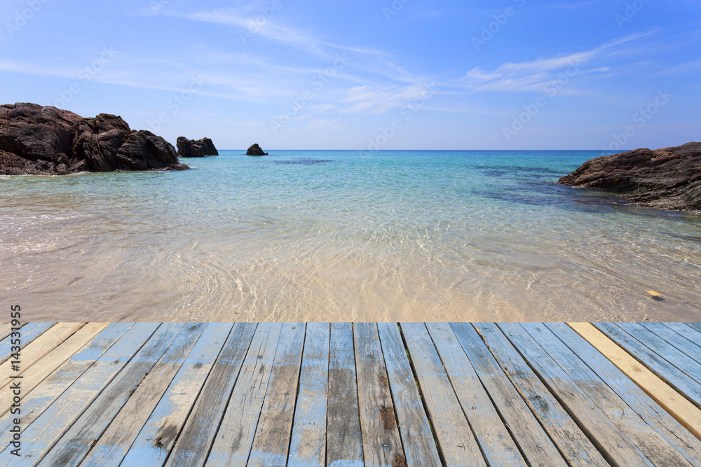 wood floor on sea surface summer wave background, landscape with clouds on horizon,beautiful natural tropical sea .