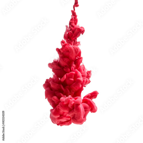 colorful ink isolated on white background. red drop swirling under water. Cloud of ink in water. 