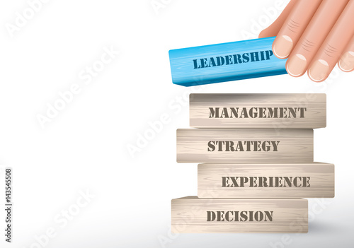 Leadership as wooden blocks tower and hand putting one piece on top