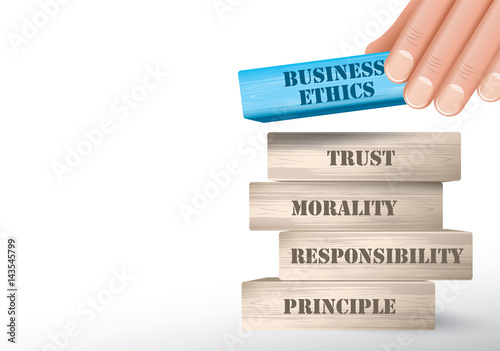 Business ethics as wooden blocks tower and hand putting one piece on top