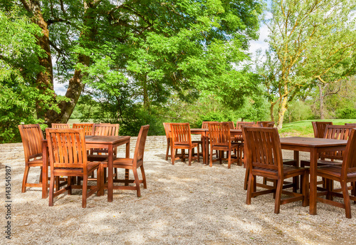 Tables and chairs of outdoor cafe in England