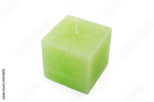 Green candle top on white background