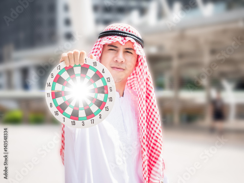 Arab businessman show a target sign photo