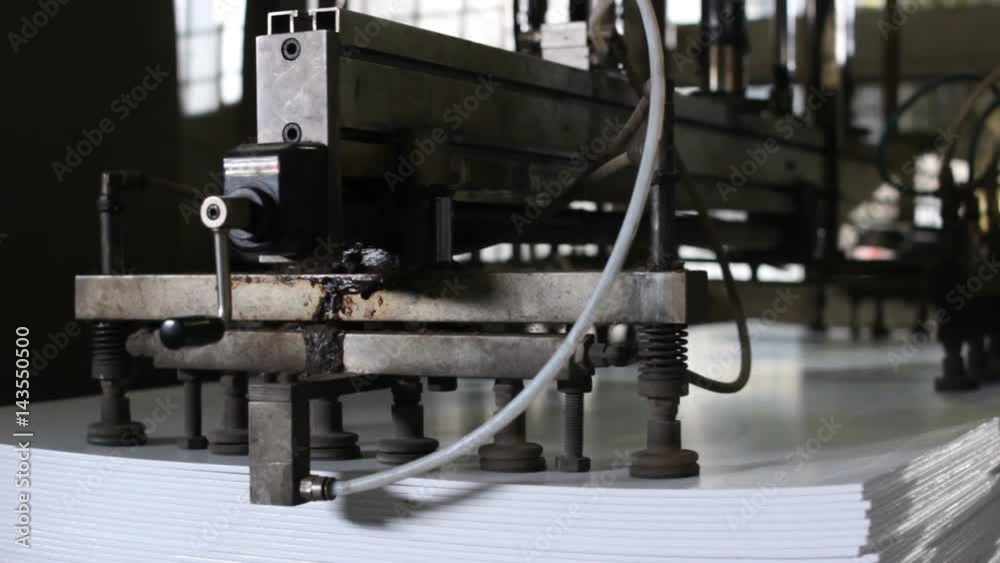 Closeup Machine Mechanical Part Takes Plastic Piece Closeup Machine Mechanical Part Takes Plastic Piece