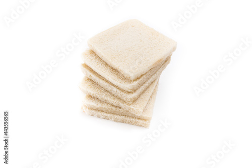 White no crust sandwich bread slices, on white background.