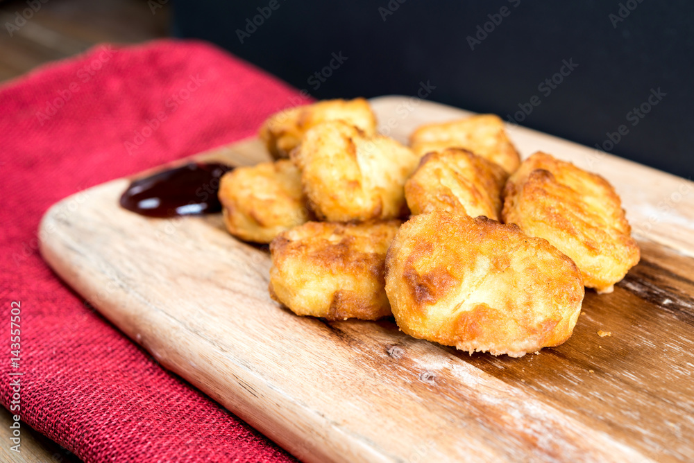 delicious fried chicken wings with sauce