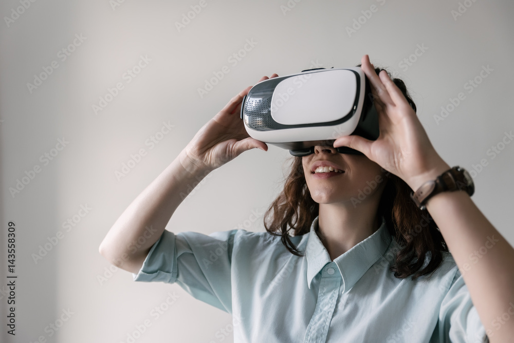 Cute girl using VR headset Cute girl using VR headset