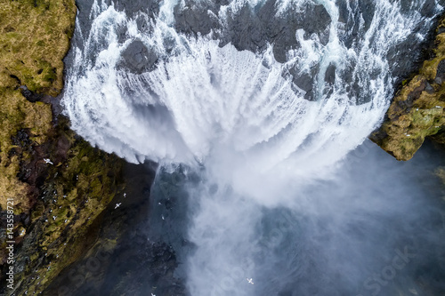 Aerial view waterfall near of famous Skogar waterfall in Iceland.