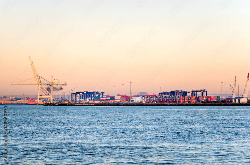 Commercial Port full of Containers at Dawn