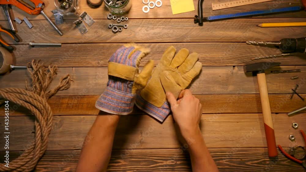 Craftsman dressing working gloves. Top view.