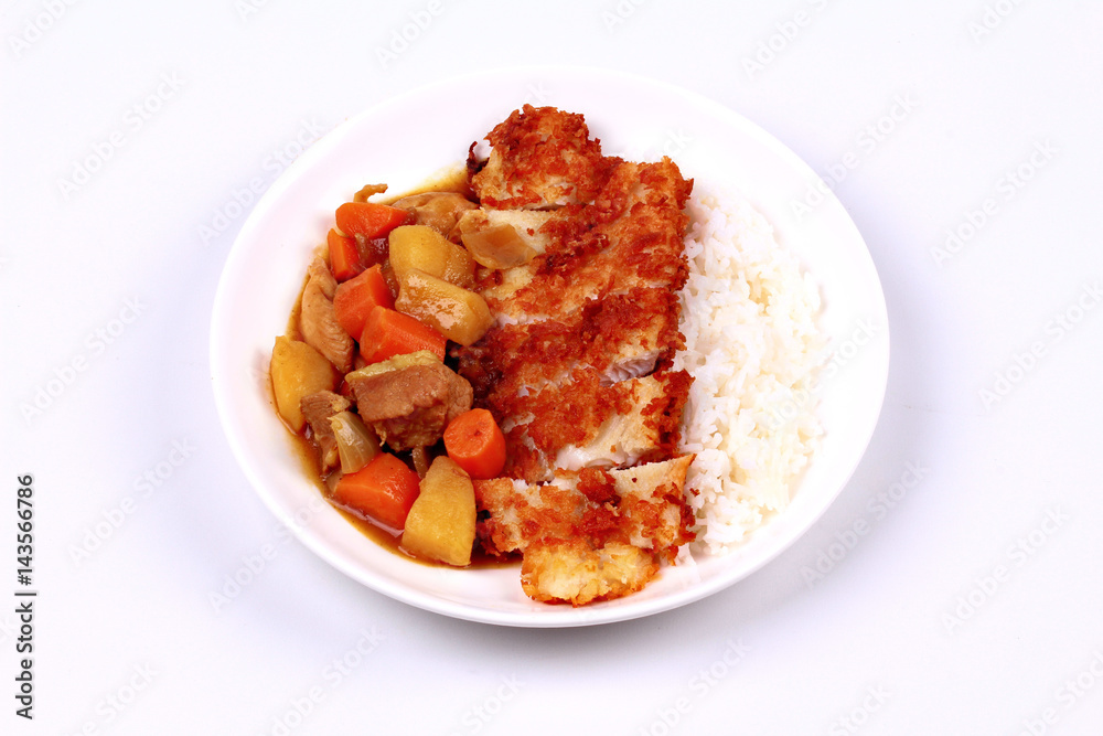 Rice with deep fried dolly fish in japanese yellow curry. Rice with deep fried dolly fish in japanese yellow curry.