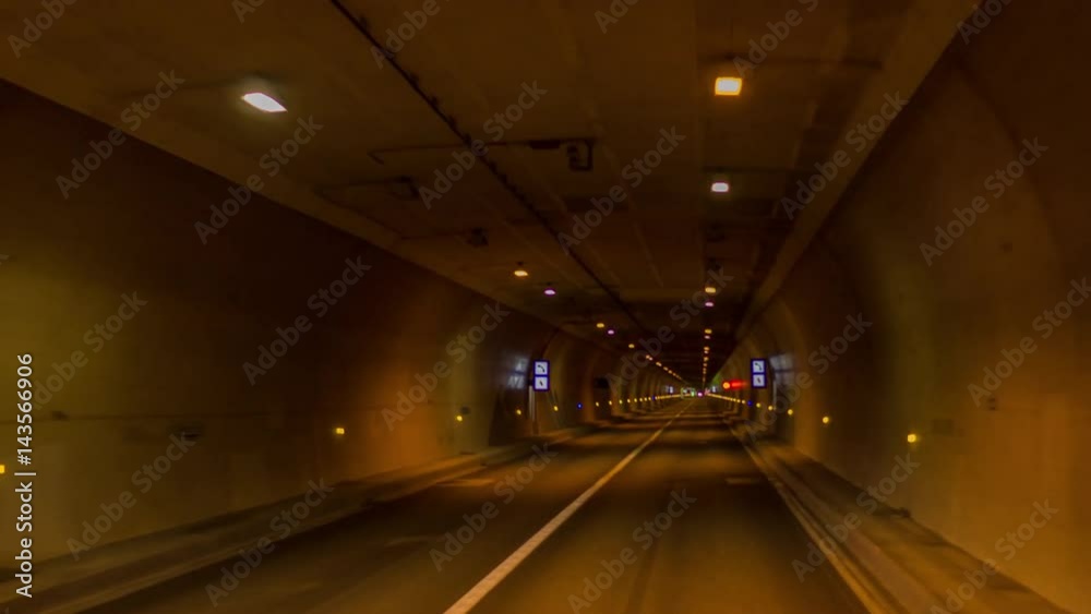 timelpase of driving through a tunnel with lights. timelpase of driving through a tunnel with lights.