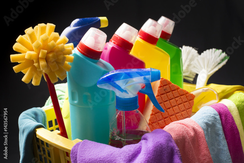 Cleaning supplies and tools in basket