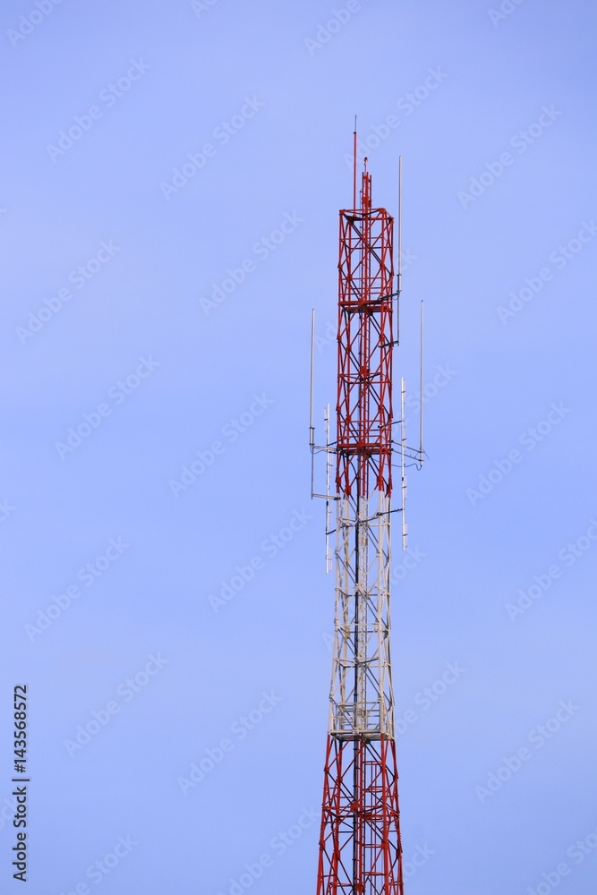 Telecommunication tower red and white antenna radio telephone mobile on sky background Telecommunication tower red and white antenna radio telephone mobile on sky background
