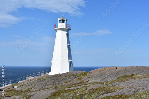 Cape Spear lighthouse on rugged coastline in Newfoundland, Canada