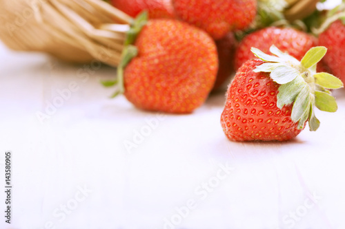 basket with strawberry on table