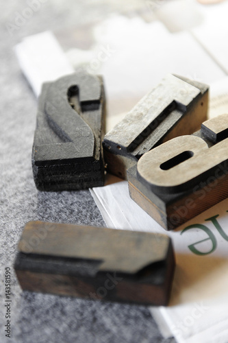 Old printing characters in wood and lead used as decorative object