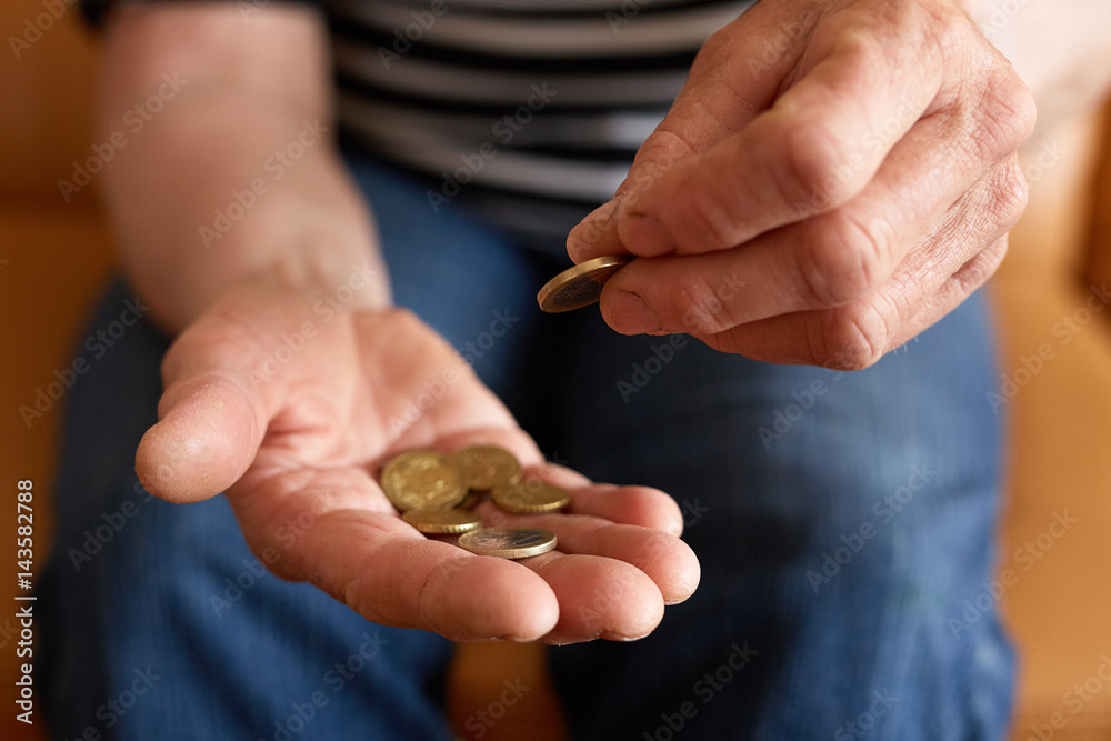 Senior woman counting money Senior woman counting money
