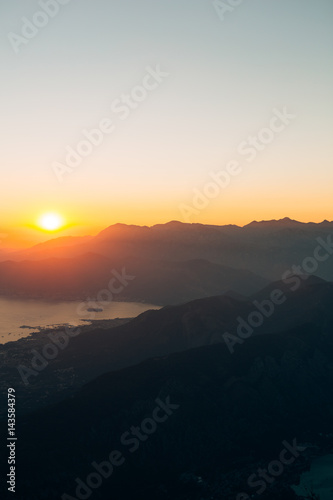 Sunset in the mountains. Sunset in the Montenegrin mountains. Sun to sit down behind the mountains.