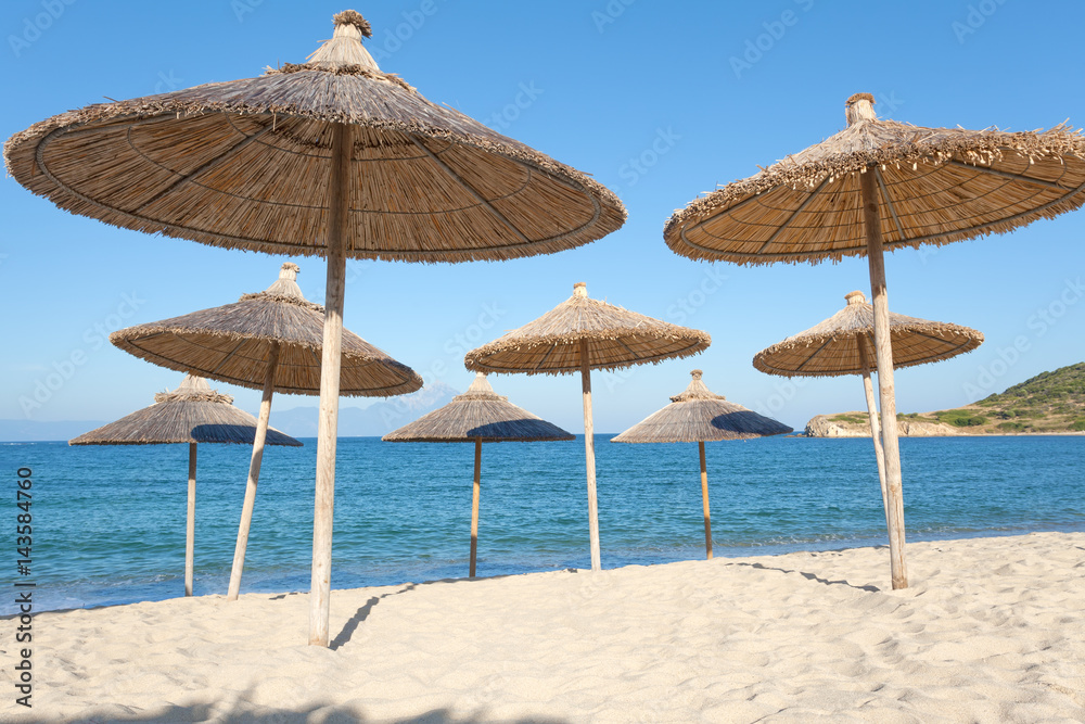 Group of parasol at beautiful Greece seashore
