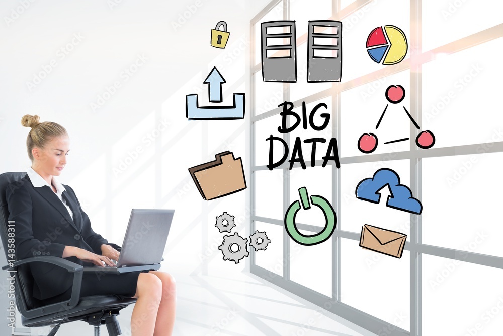 Businesswoman analyzing big data on laptop in office Businesswoman analyzing big data on laptop in office