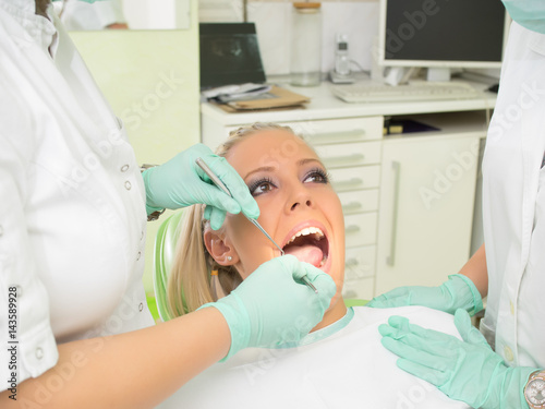 Girl having a dental examination