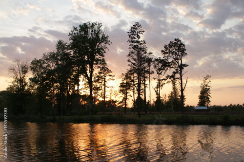 Cloudy skies and sunsets photo