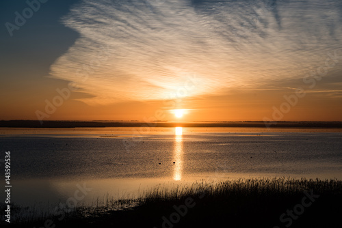beautiful sunrise over country lake