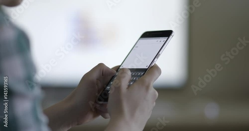 Texting woman on a smartphone device, high quality 4k