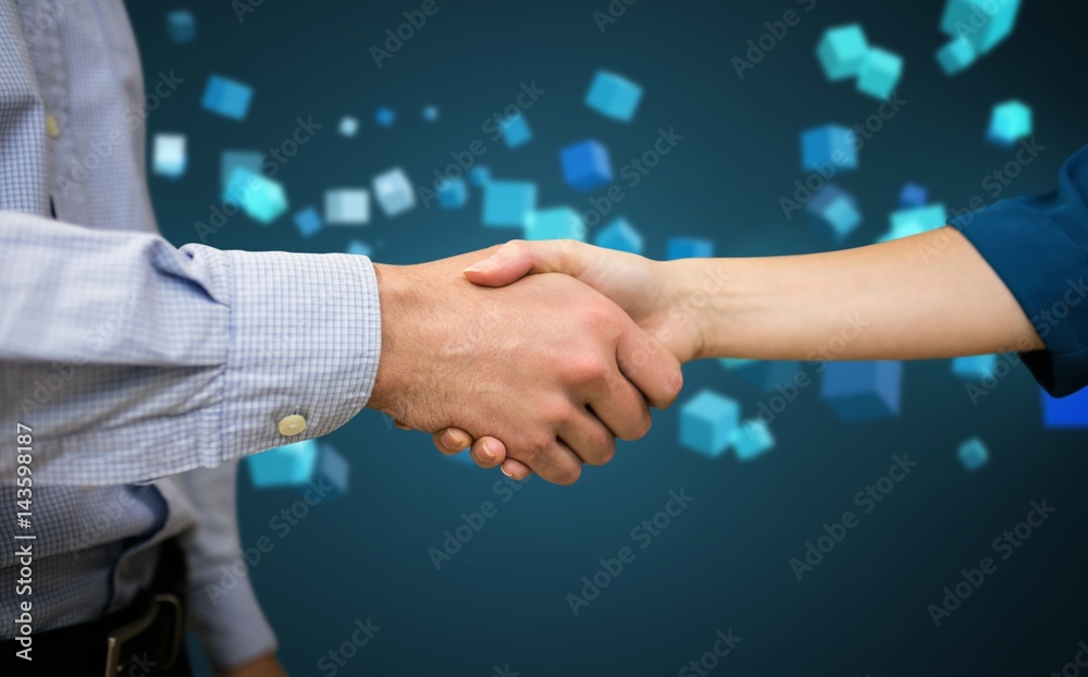 Composite image of male and female collegues shaking hands Composite image of male and female collegues shaking hands