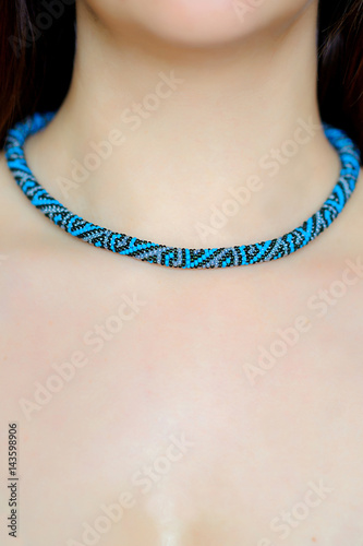 girl with beautiful jewelry on a neck, female costume jewelry, gifts to girls