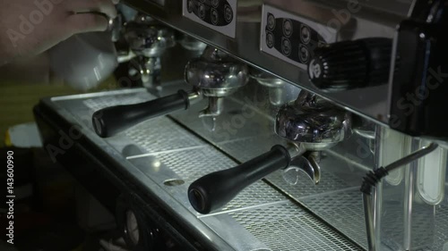 Coffee making process. Bartender work on a espresso machine