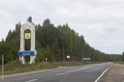 Stela at the entrance to the Arkhangelsk Region on the road from Veliky Ustyug to Kotlas, Russia photo