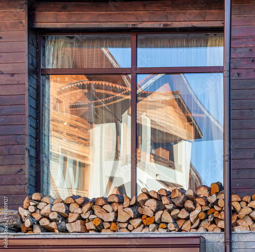 Beautiful refkection in the window of the house in the Bansko - Bulgaria photo