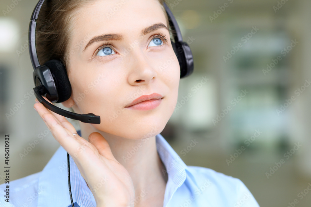 Call center operator. Portrait of beautiful business woman in headset. Call center operator. Portrait of beautiful business woman in headset.