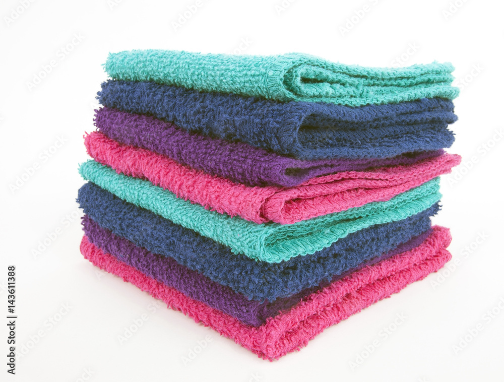 Front and side view of stacked washcloths. Isolated. Front and side view of stacked washcloths. Isolated.