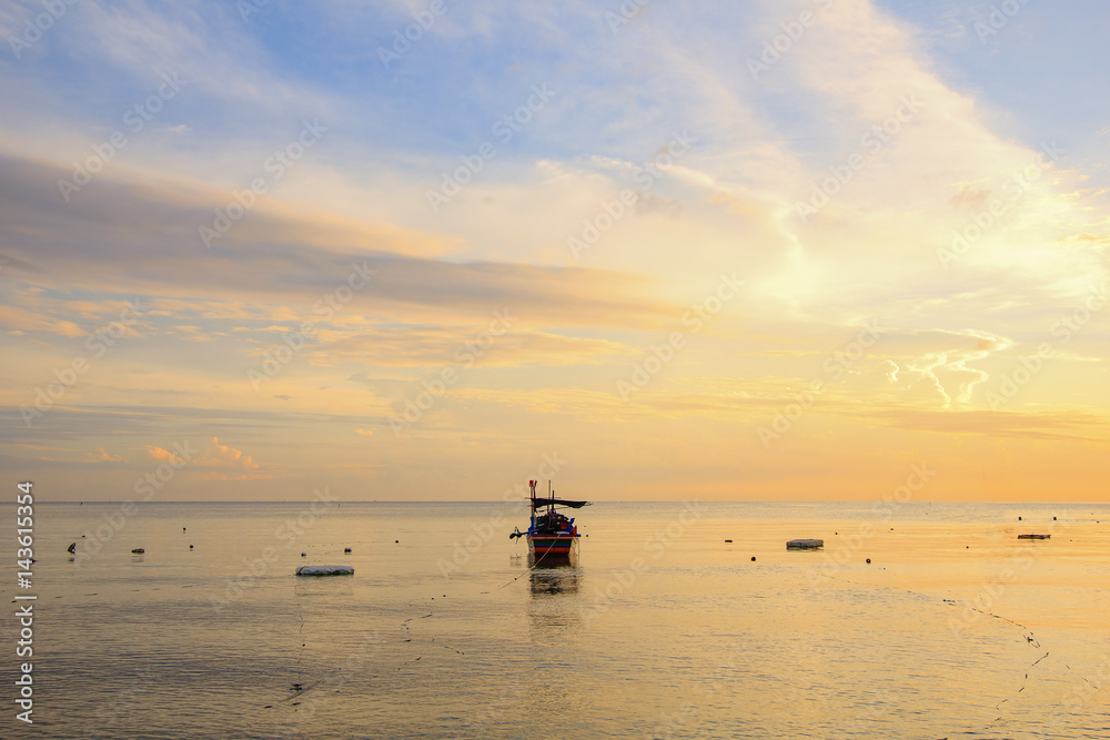 Single small fishing boat in morning ; Songkhla province, Thailand