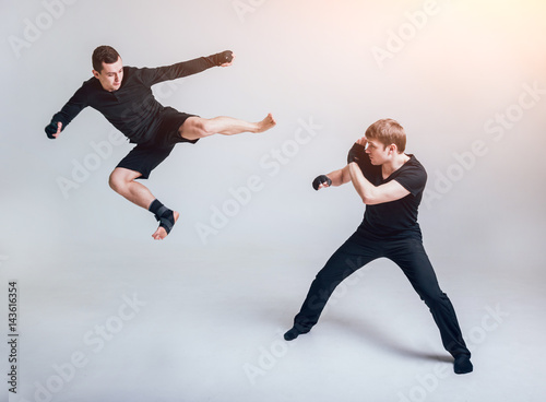 Street fighters fight against a white background.