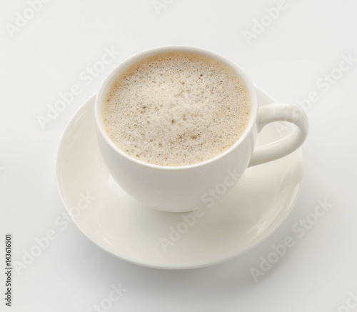 Coffee cup and saucer on a white background.