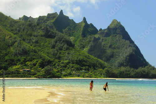 Haena Beach Kauai Hawaii 2 Girls Wading Bali Hai Makana Ridge Background