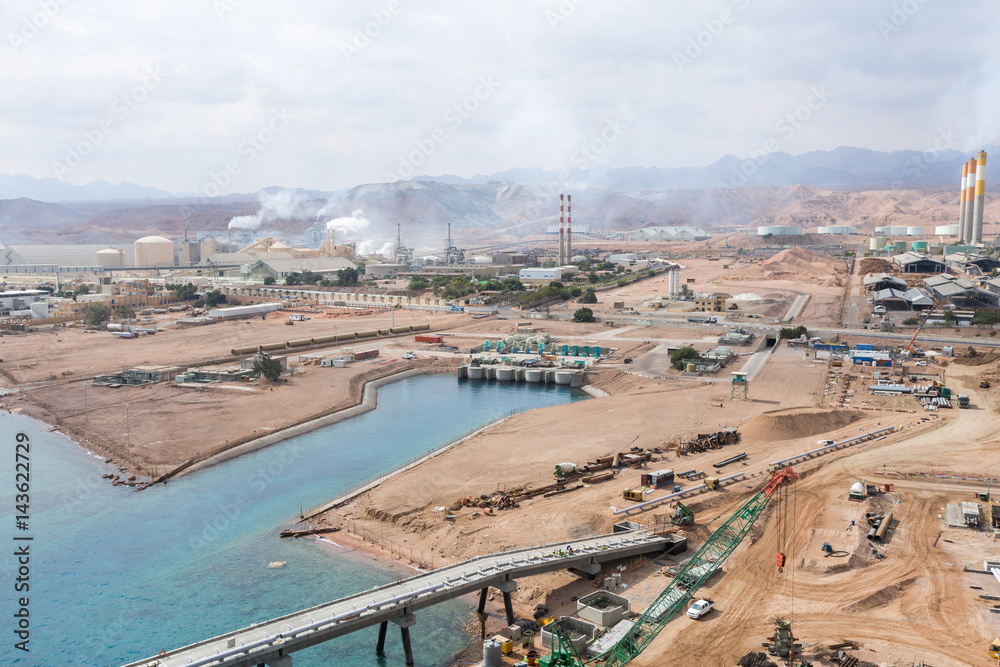 Aqaba, Jordan, 10/10/2015, Metal and concrete Jetty foundation construction at the Aqaba new port photographed from above