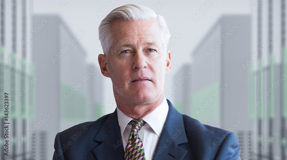 Senior businessman in server room Senior businessman in server room