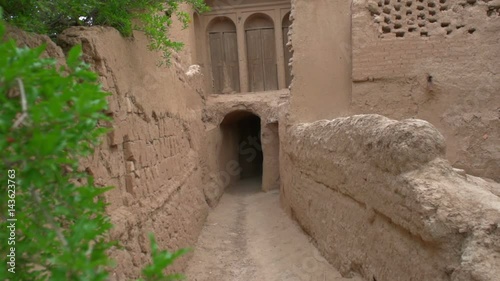street in a historical part of the city of Meybod in sunny day, the city in the central part of Iran.