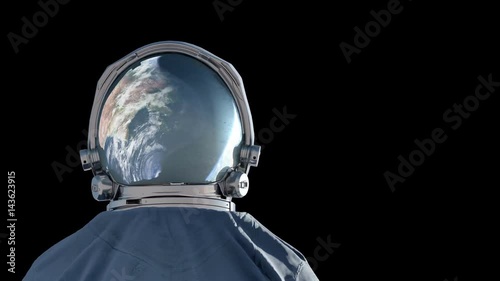 Spacewalking astronaut, close up. Earth reflected in visor