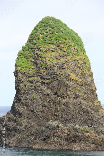 せたな町の海岸に並び立つ三本杉岩の一本(北海道) photo